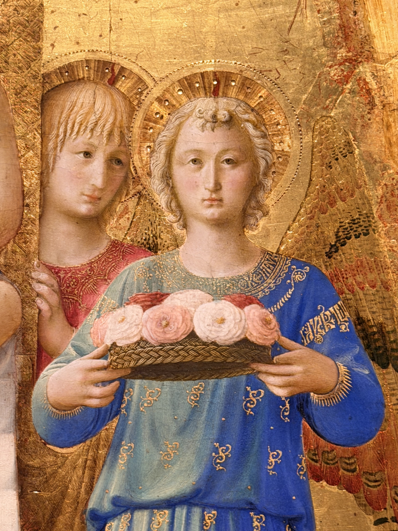 Sassett'a iconic use of color in his painting, Madonna and Child with Angels