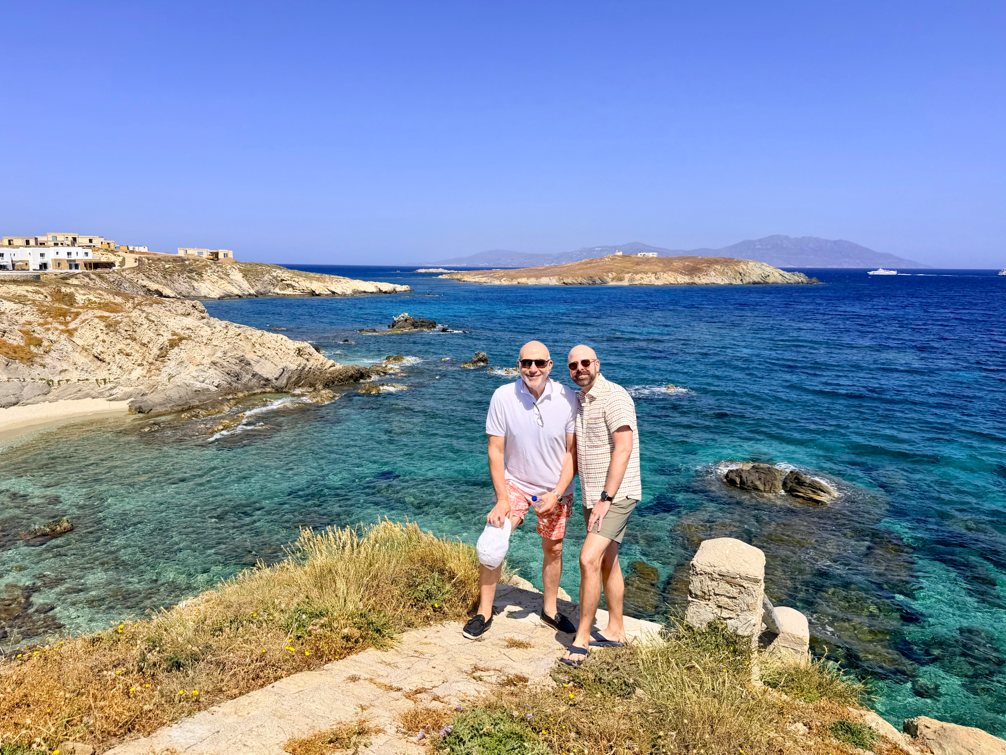 Charles and Greg with the crystal cove of Agios Ioannis Charles and Greg with the crystal cove of Agios Ioannis