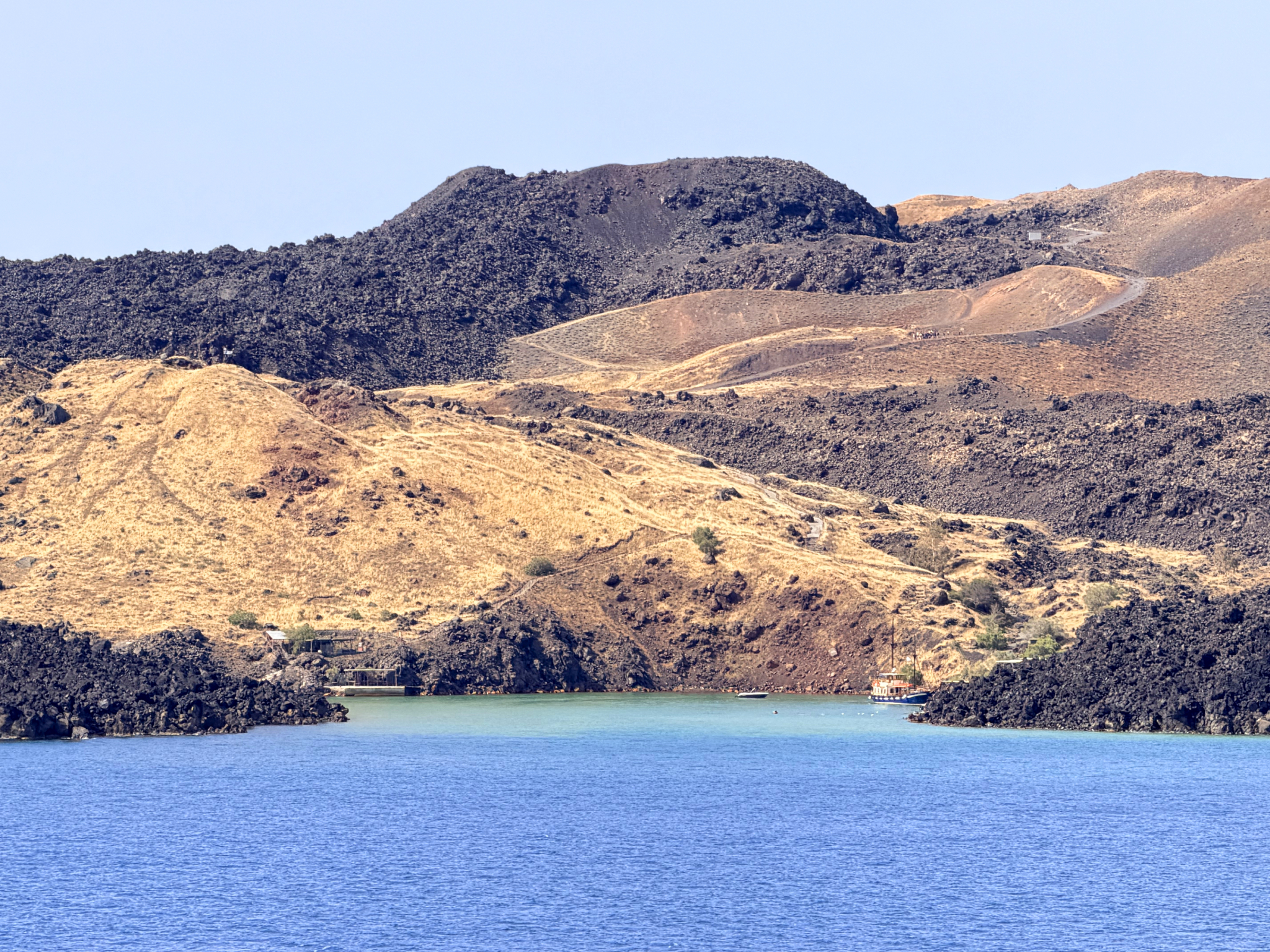 Nea Kameni Island, an active volcano in the Santorini Caldera Nea Kameni Island, an active volcano in the Santorini Caldera